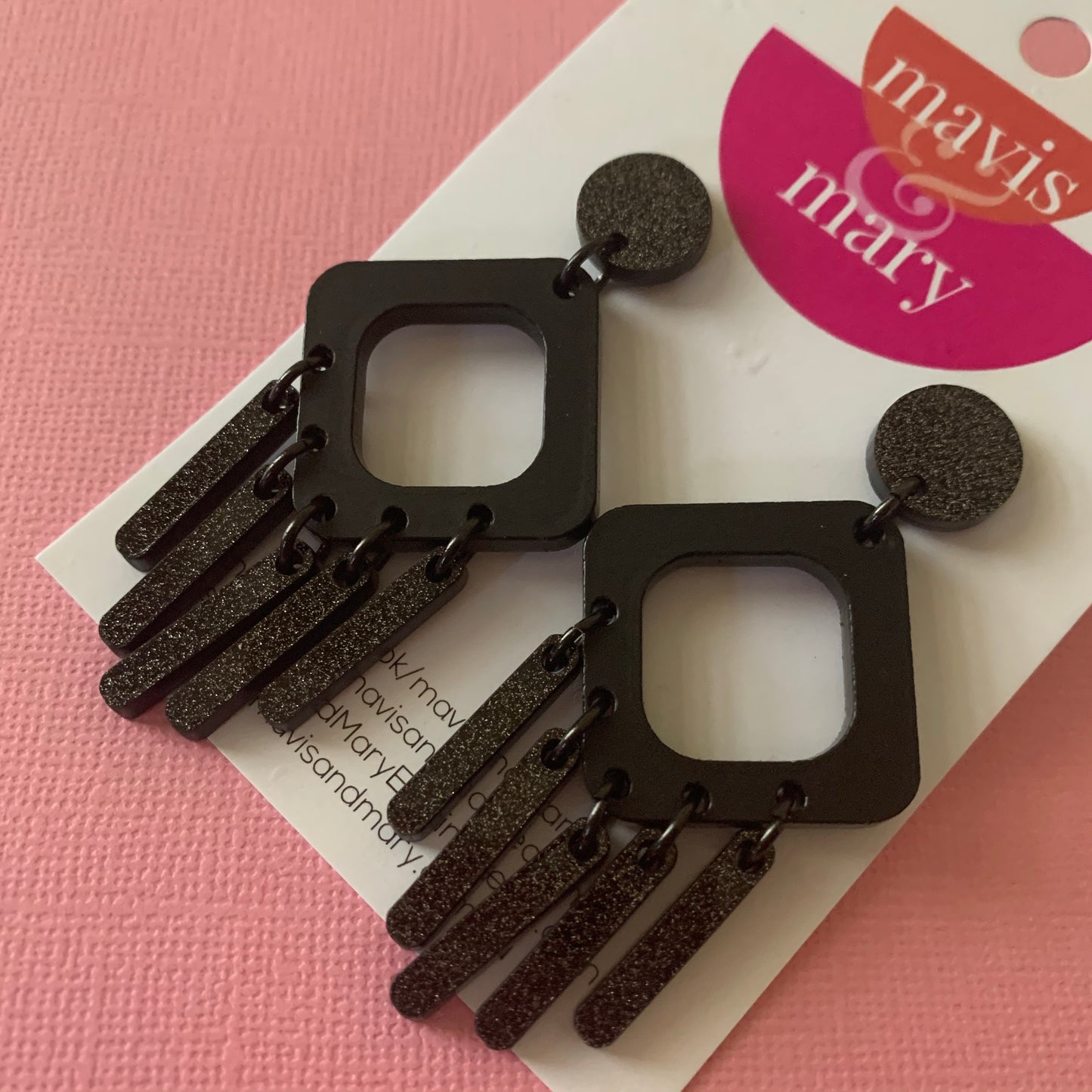 Black cut out dangle