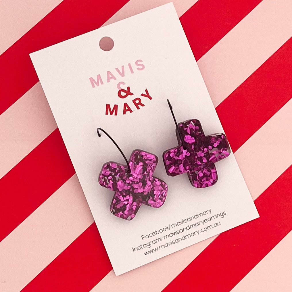 Purple crosses on black hoops