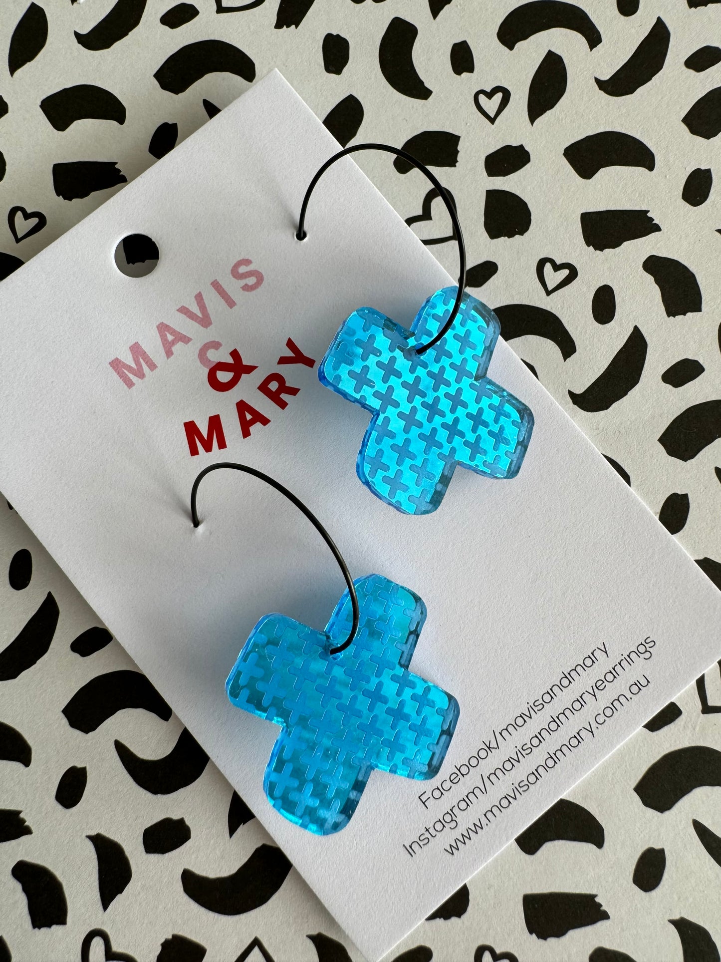 Mirror cross aqua